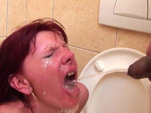 Deep throat cock sucking on a public toilet