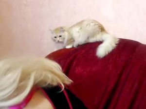 Blonde is playing with her pussy